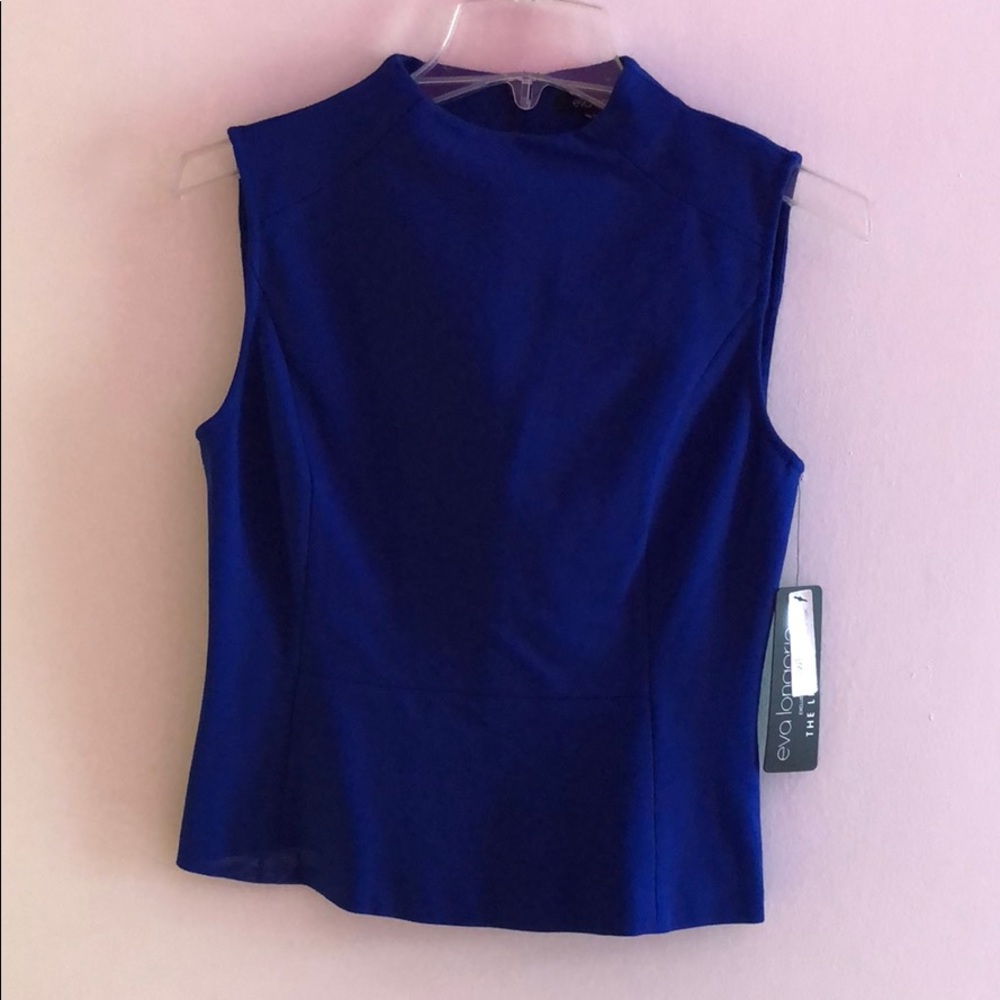 Eva Longoria blue top with tags